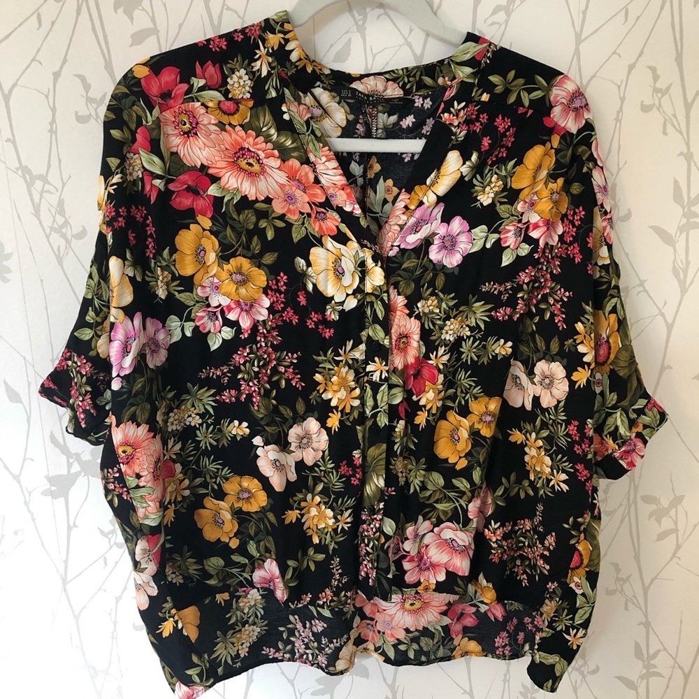 A set of Zara Flowing Floral Print Blouse